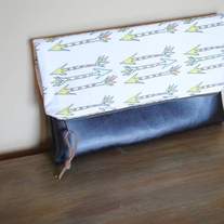 arrow clutch. fold over clutch with faux leather bottom