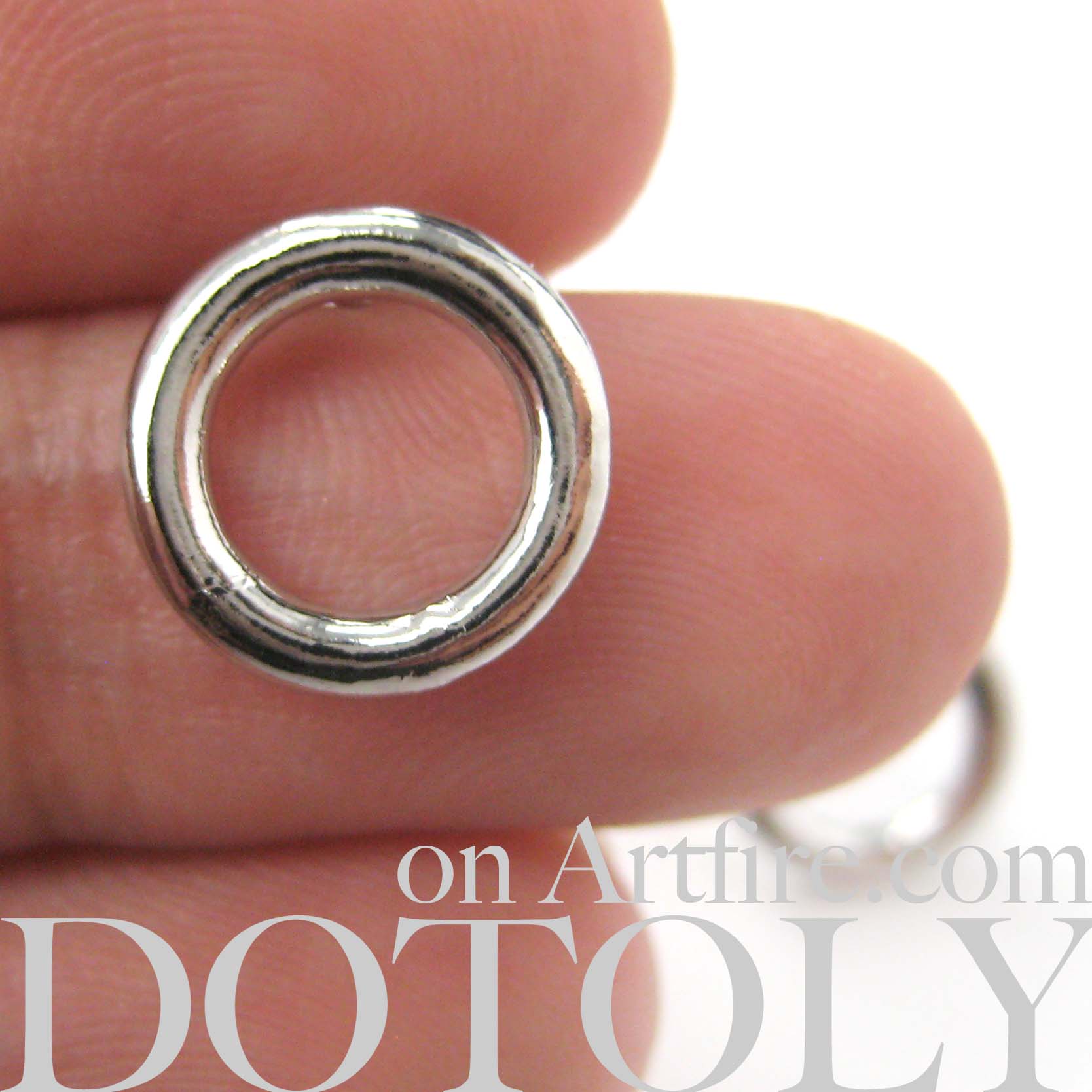 Small Round Hoop Cut Out Stud Earrings in Silver · DOTOLY Animal