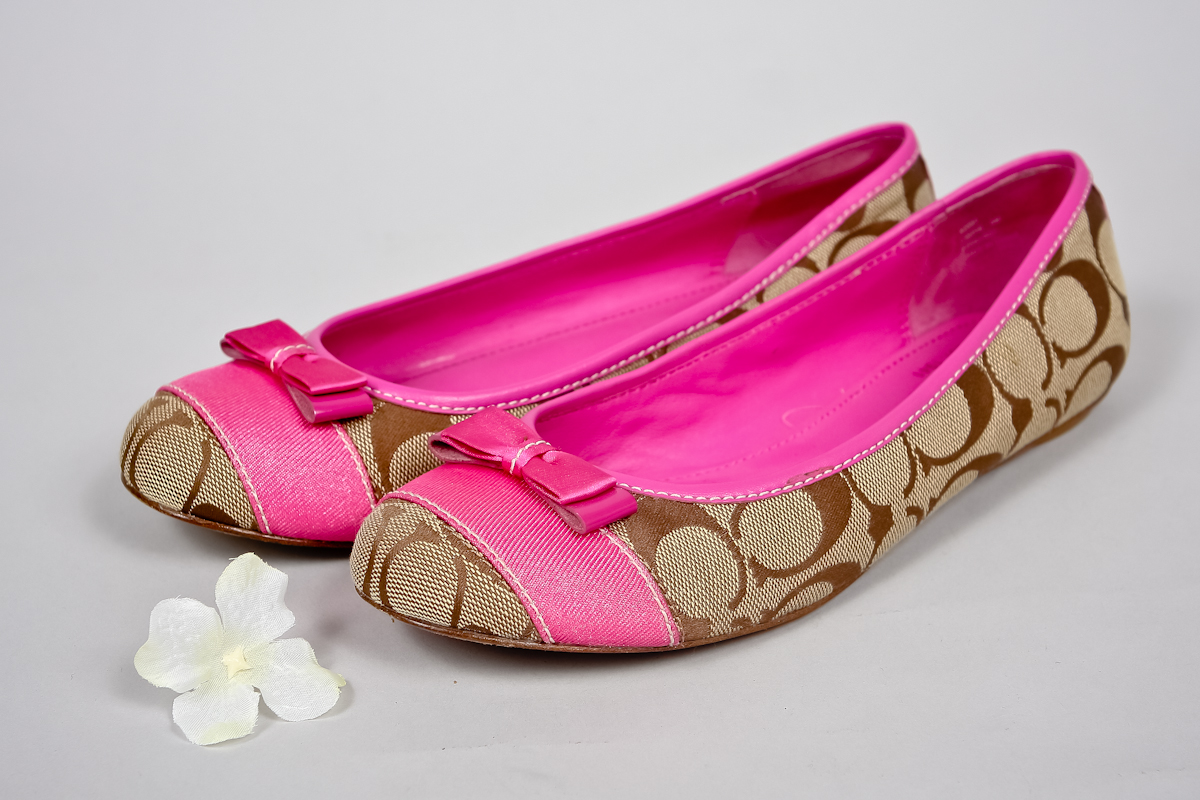 pink coach flats