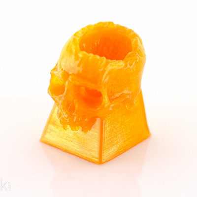Orange skull keycap