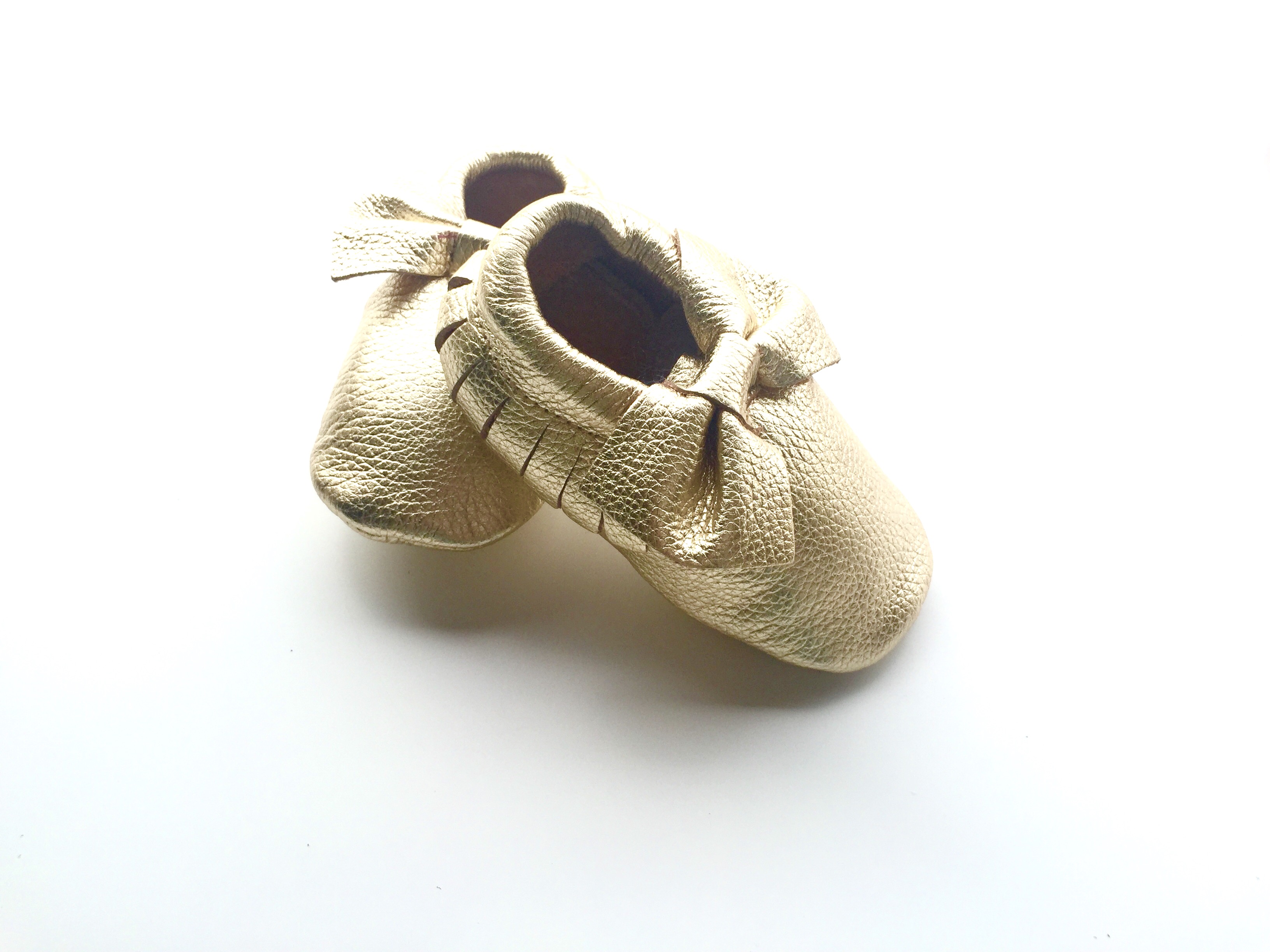 gold baby moccasins