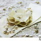 Wedding_20sash_20with_20fabric_20flower_20and_20pearls_20champagne_20viogemini2_small