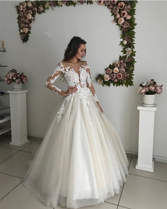 long sleeve lace wedding dress with tulle skirt